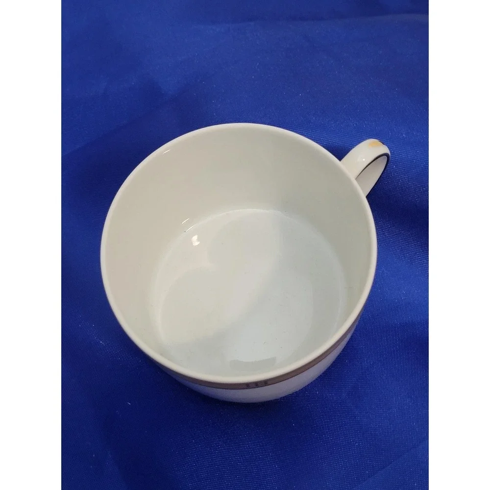 Porcelain Tea Coffee Cup and Saucer, Bernardaud Limoges Roulette Pattern